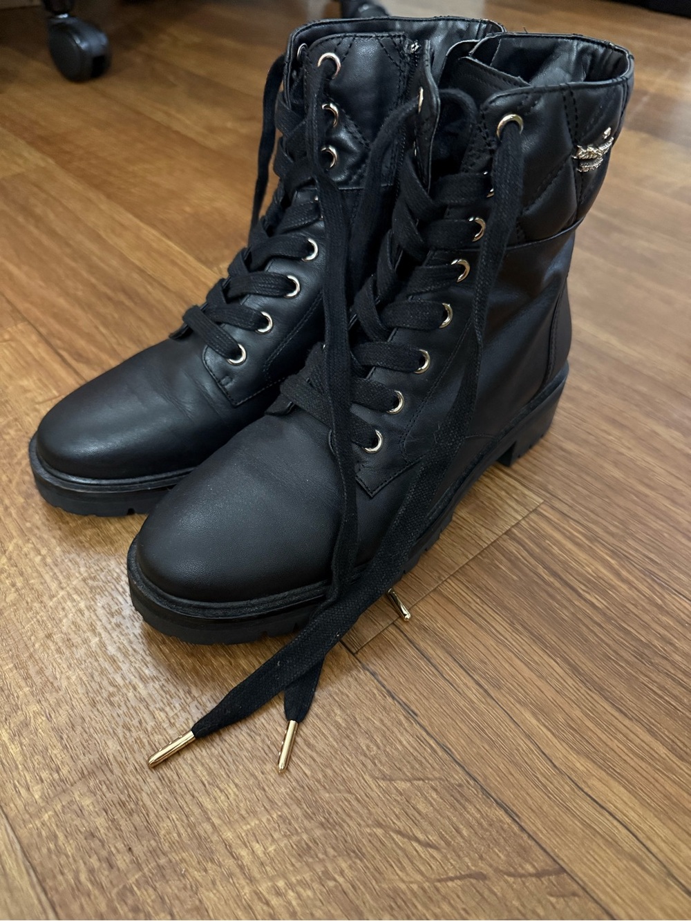 kate spade Black Lace-Up Ankle Combat Boots with Gold-Tone Accents